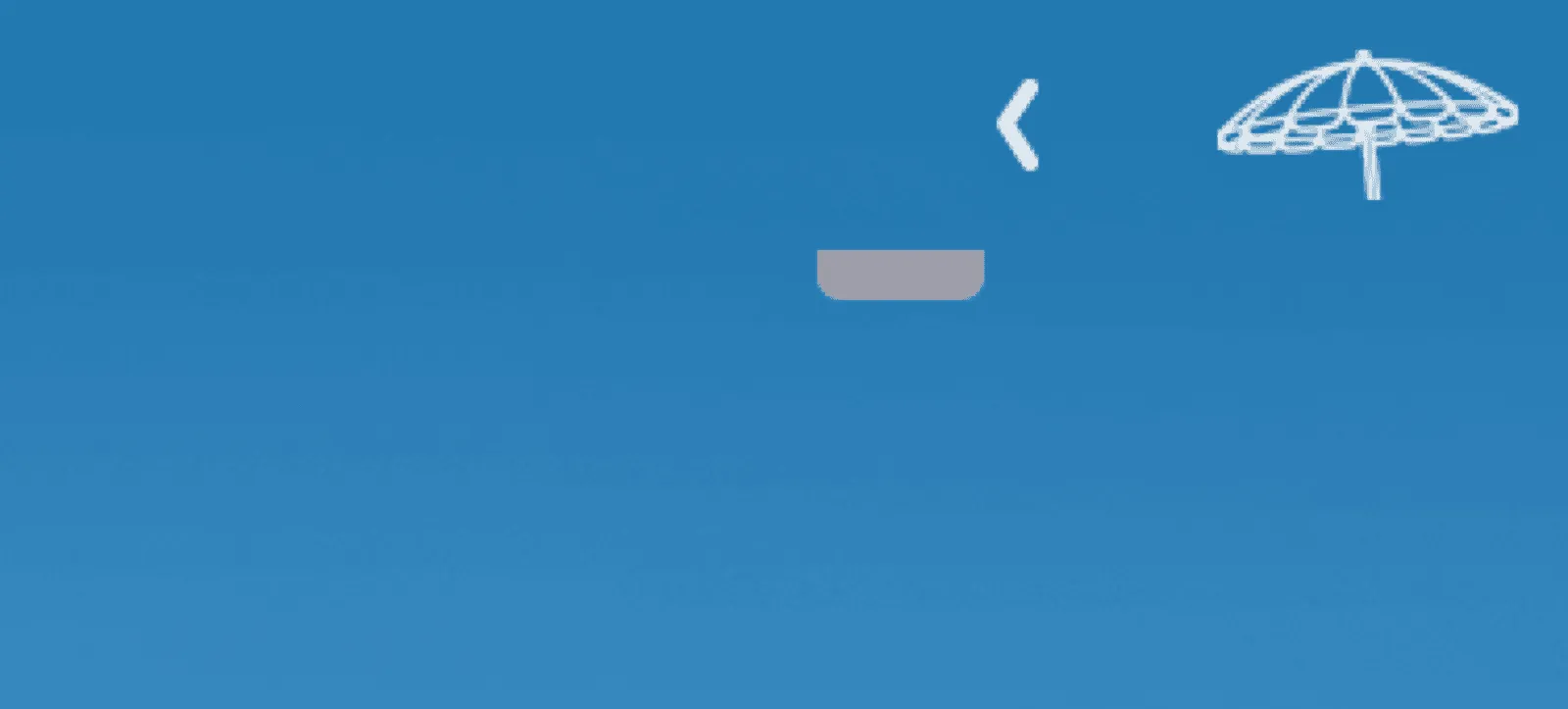A desktop with the shade closed; only the small pull tab is visible below the menu bar.
