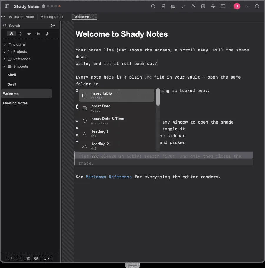 The slash command picker open in the editor, listing available commands with icons.